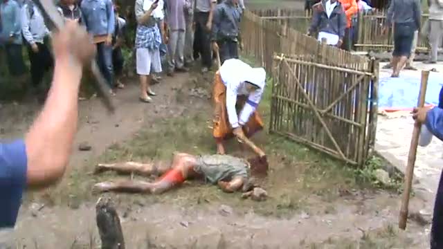 File:Indonesian muslim mob beats three ahmadis to death.jpg